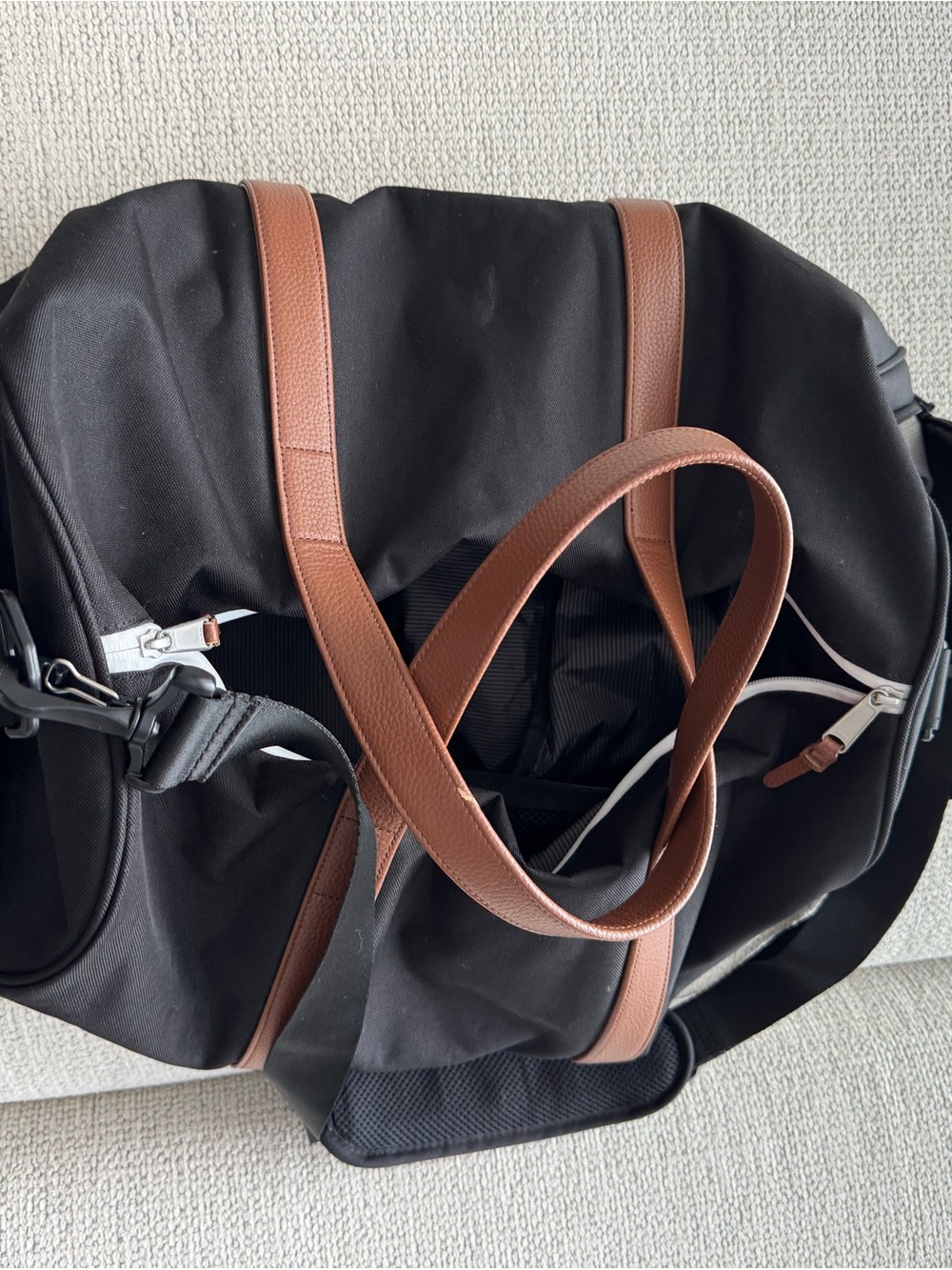 Classic Black Duffel Bag with Brown Handles